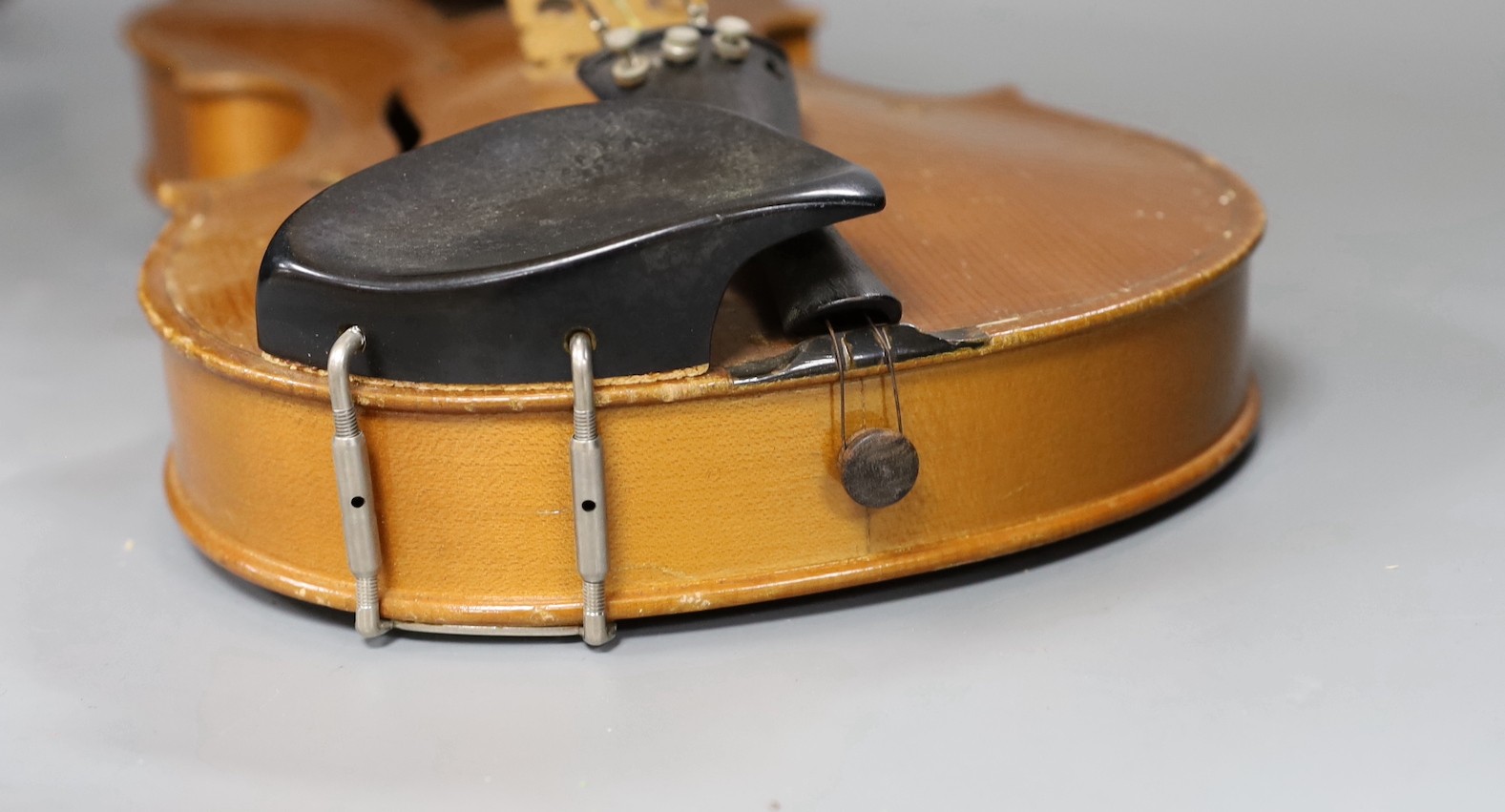 A cased 20th century Romanian violin, back measures 35.5cm excl button